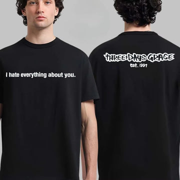 A man modeling a black short-sleeve T-shirt, shown from both front and back. The front has white text reading 'I hate everything about you.